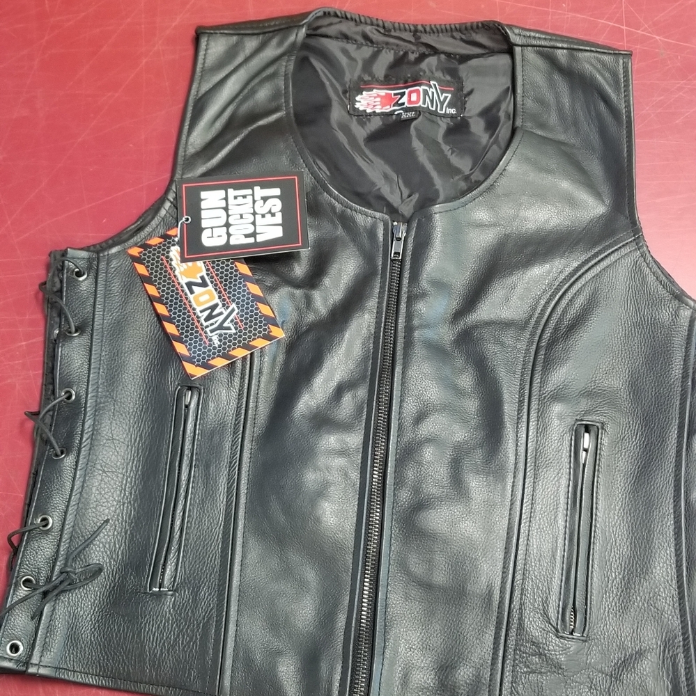 Women's leather vest with concealed weapon pockets